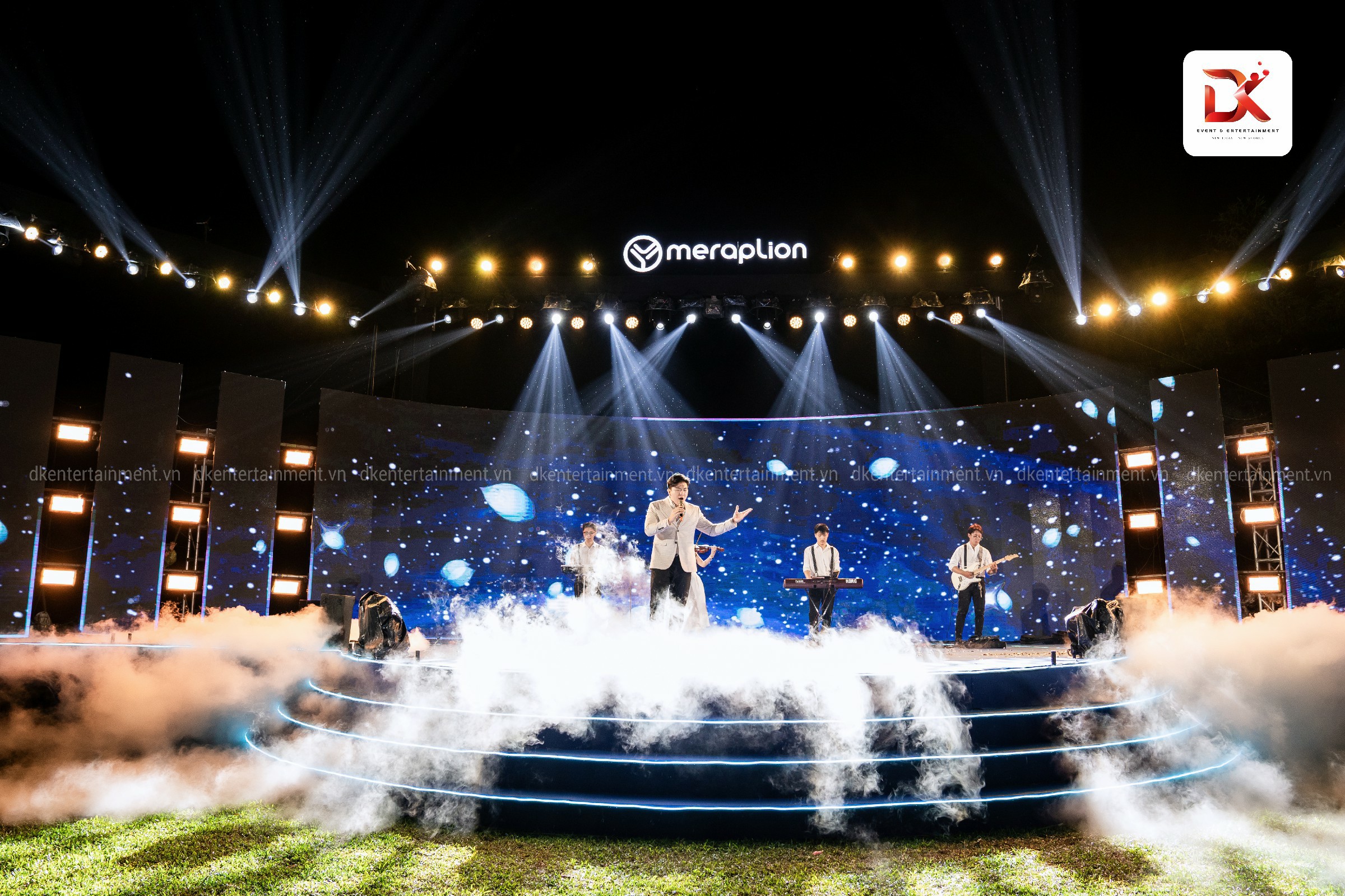 Guests watching engaging entertainment acts at a year-end party by an event agency in Ho Chi Minh.